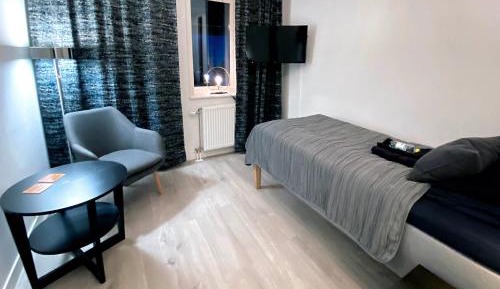 Single Room with Shared Shower and Toilet