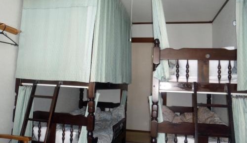 Single Bed in Dormitory Room