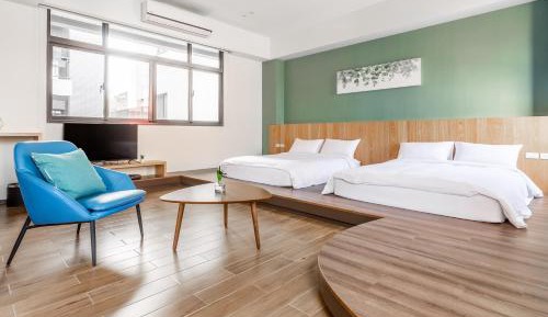 Deluxe Quadruple Room with Garden View and Balcony