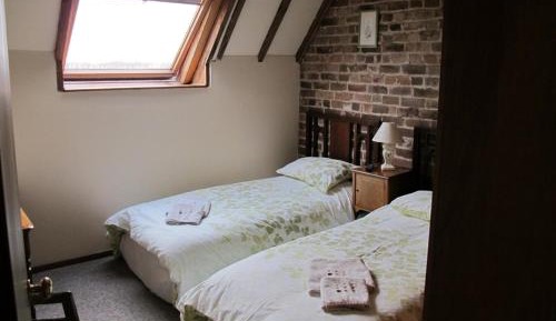 Quadruple Room with Private Bathroom