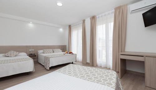 Quadruple Room (2 Adults + 2 Children)