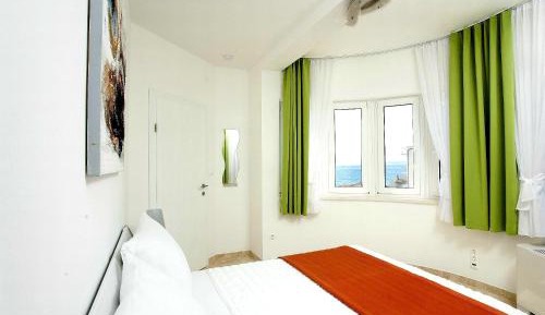 Two-Bedroom Apartment with Balcony and Sea View
