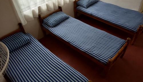 Single Bed in Male Dormitory Room