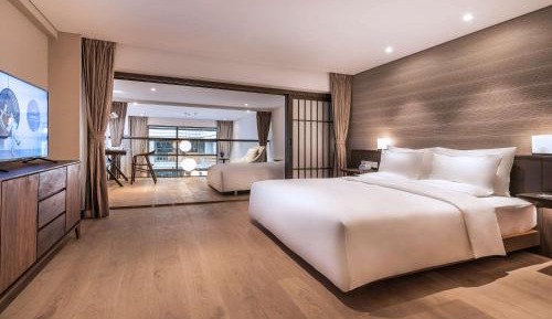 Deluxe Suite with One Double Bed and One Single Bed