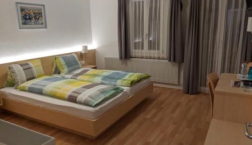 Family Room (2 Adults + 2 Children) with Balcony and Mountain View