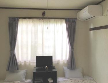 Quadruple Room with Shared Bathroom