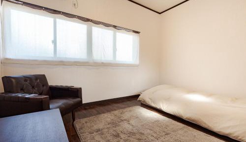 Single Room with Shared Shower and Toilet