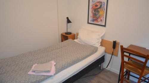 Single Room with Shared Shower and Toilet