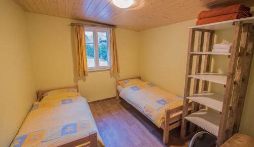 Basic Twin Room with Shared Bathroom (for 18-34 years only)