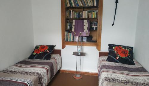 Single Bed in Dormitory Room
