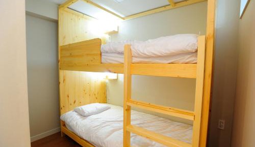 Single Bed in Male Dormitory Room