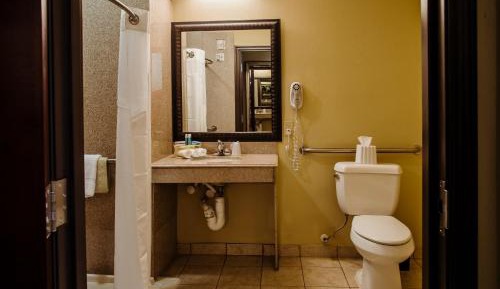 Queen Room with Two Queen Beds Hearing Accessible with Roll-In Shower - Non-Smoking