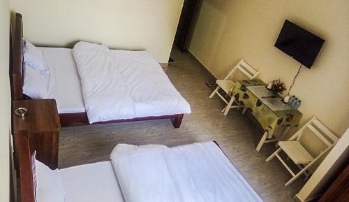 Quadruple Room with Private Bathroom