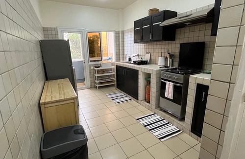 Dakar Apartment | Escape in Dakar: Bright and Airy Rental Steps from the Marina!