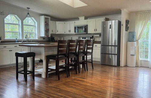 Montgomery House | Spacious house with an open floor plan. Family friendly. Serene back yard.