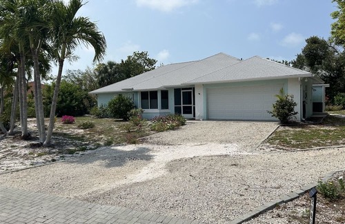 Sanibel House | Wild Lime Home - West end home with heated pool