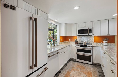 Ocean Ridge Villa | A&J Hideaway:Beautiful Resort Villa Overlooking Golf Course & Tranquil Lagoon; Screened Porch