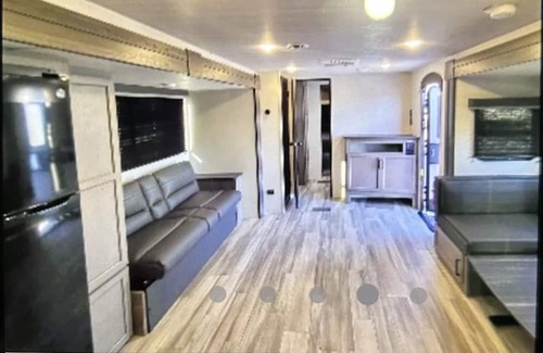 Thomson House | Come play with Scottish highland cows in a beautiful and cozy brand new RV!