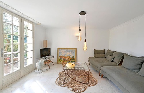 Laval-Pradel Apartment | Decorative and cozy vacation apartment with communal pool and idyllic garden.
