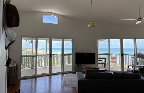 Yeppoon House | Yeppoon beachside oasis with epic island views, gorgeous breezy deck & air con