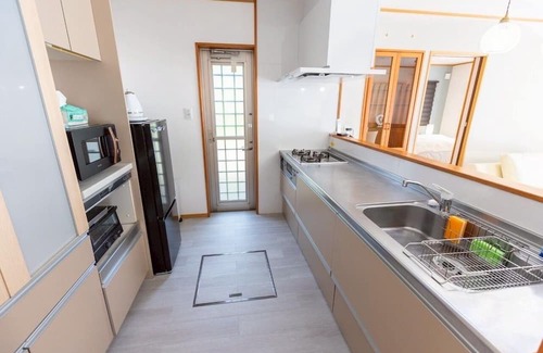Miyakojima Villa | Exclusive view of the star-filled sky on the rooftop terrace. Walking distance from Imgarma Marine Garden (1.1km). Privileges: Free Miyako soba noodles, BBQ set rental, and star photography can be arranged. Unattended check-in support.