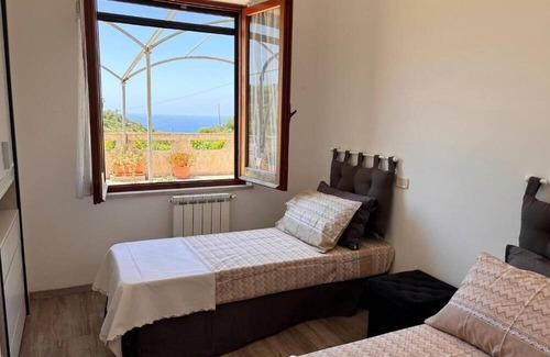 Magomadas Apartment | Bosa Apartment large terrace with a view