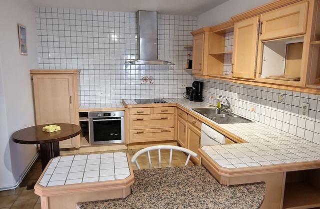 Small house on the village square in Luzech