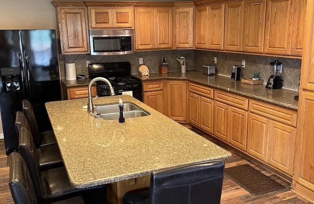 Ride to the ATV trails from this Spacious 4-bedroom house with RV hookup!