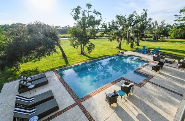 Modern Bayou Home | Pool and Tennis Court