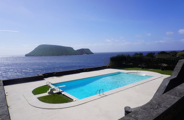 Enormous pool and 180 degree ocean view home for 12