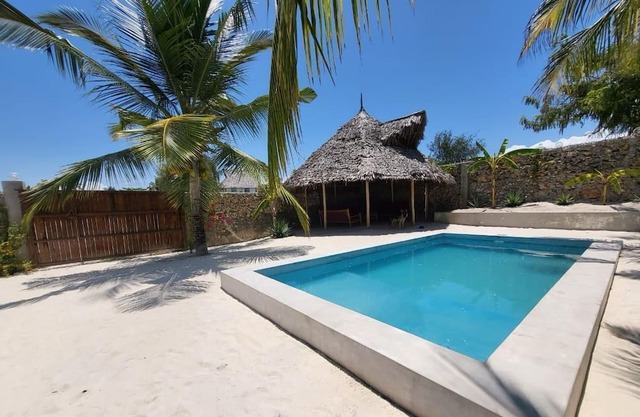 SAND BEACH PALM RESIDENCE