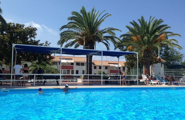 Holiday Apartment "Bilocale 85 Residence La Giungla" with Sea View, Shared Pool & Wi-Fi