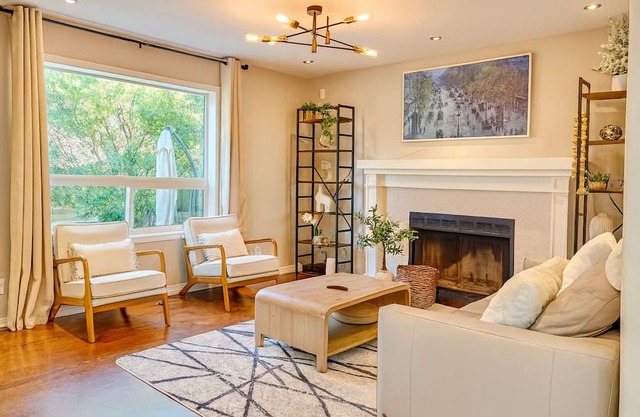 Modern 4BR Home with Garage, Fireplace & Backyard